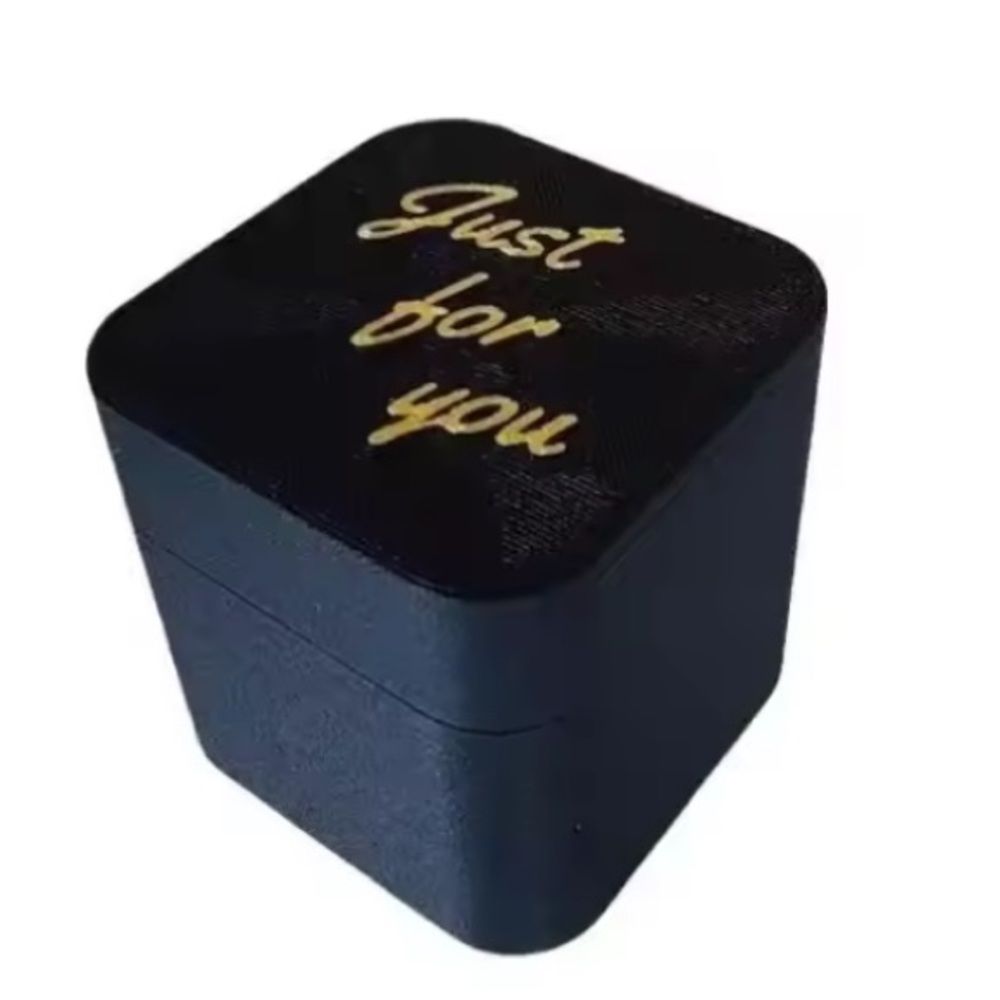 Black Gift Box with Gold Text